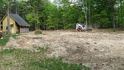 picture of rough yard being cleared